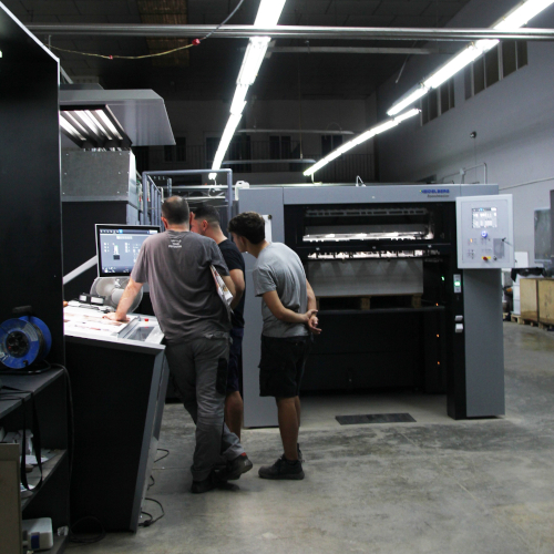 Pentagraf Impresores, parte del equipo de producción en la salida de la Speedmaster