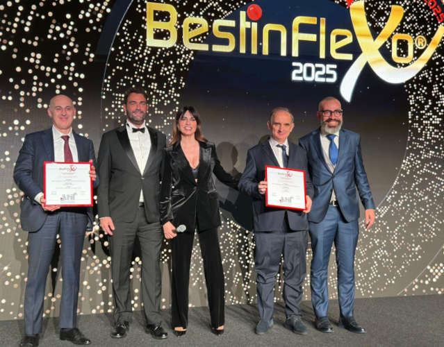 Matteo Angiulli, owner of Decograph, and his team in front of the Mark Andy Evolution E3 flexo press